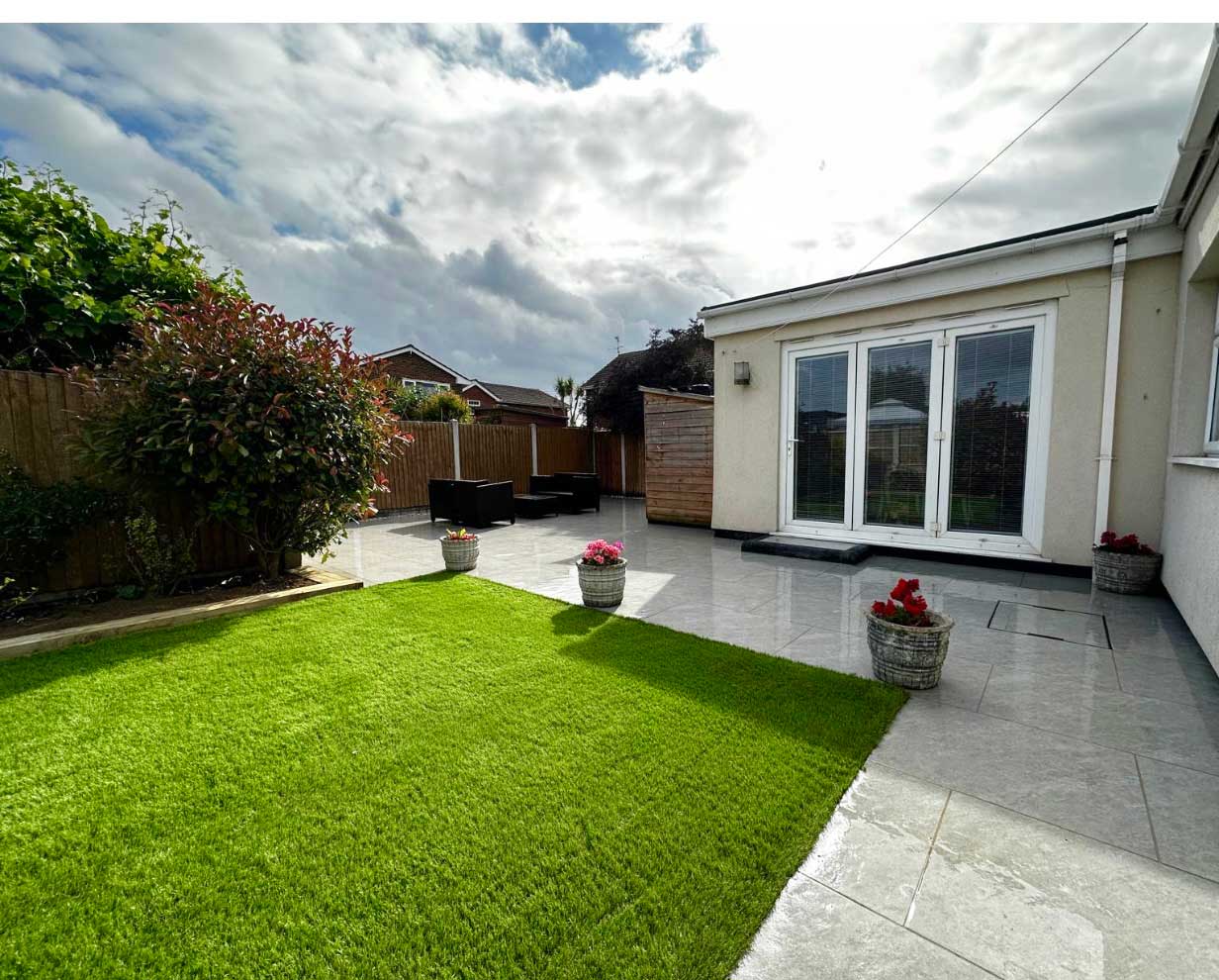 House with beautiful terrace and green plot